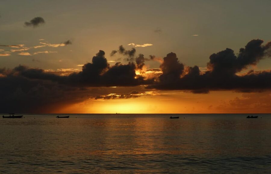 Bridgetown: Barbados Coastline Sunset Luxury Cruise - Returning to Bridgetown under a changing sky