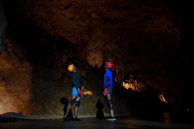 Caving Exploration Adventure at Harrison's Cave by Chukka - Harrisons Cave on hands and knees
