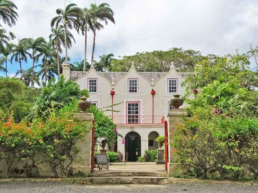 Monkey Feeding & Historic Sugar Plantation & Rum Distillery - St. Nicholas Abbey, a plantation house with a working distillery